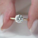 Load and play video in Gallery viewer, 2 CT Round Cut Classic Solitaire Hidden Halo Moissanite Diamond Ring